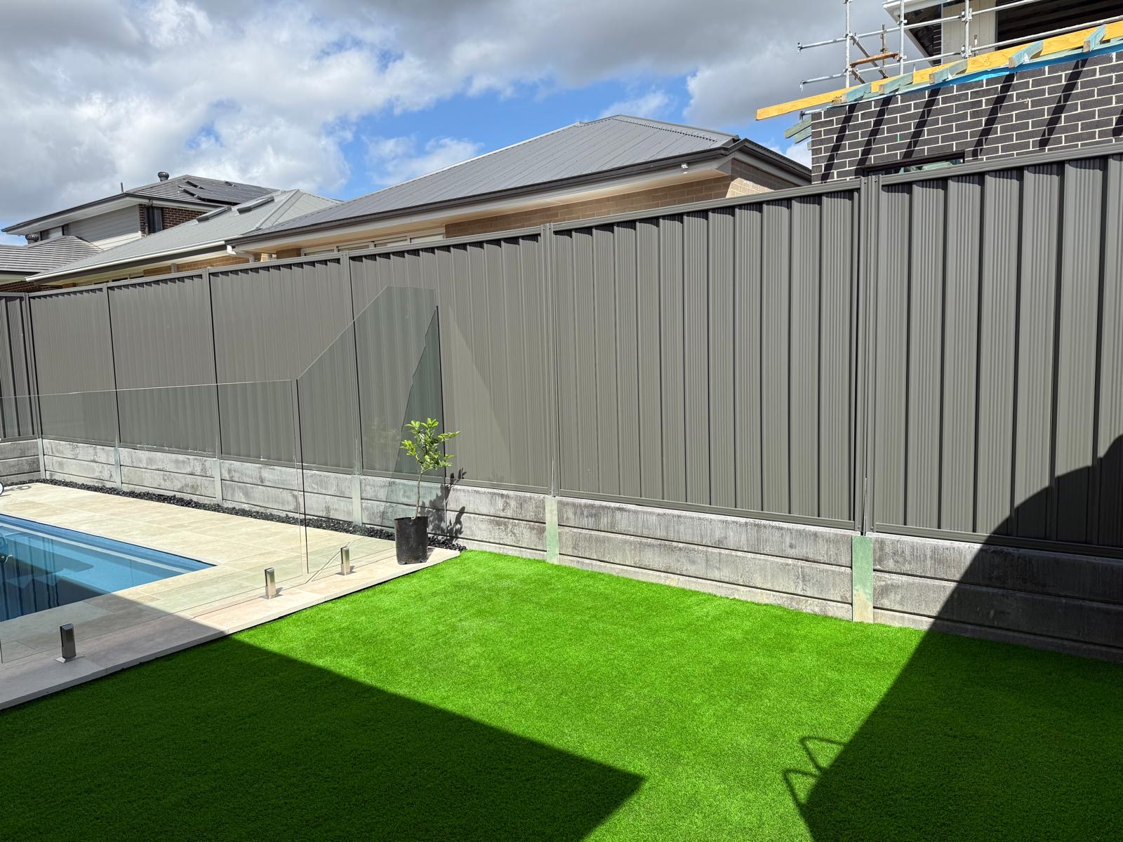 Before and after garden transformation Sydney - overgrown yard converted to modern family outdoor space
